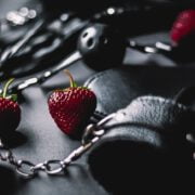 black leather and strawberries
