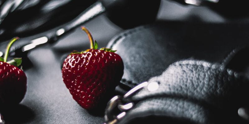 black leather and strawberries